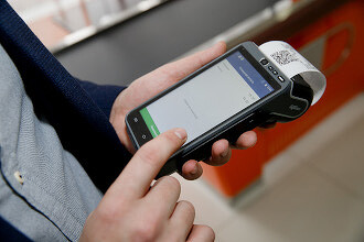 Крупный производитель кассового оборудования распродает активы из-за долгов